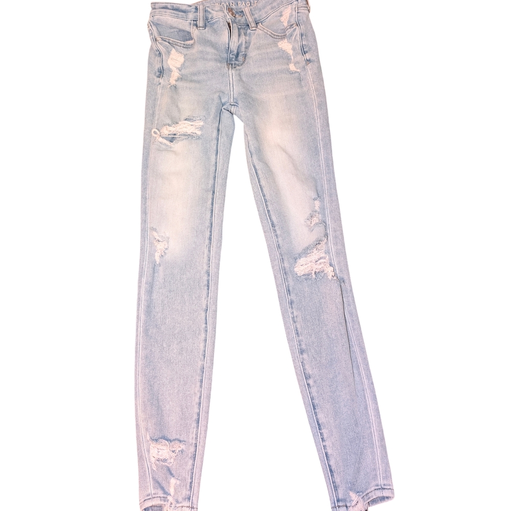 American Eagle Outfitters Faded Blue Ripped And Patched Skinny Dream Jean